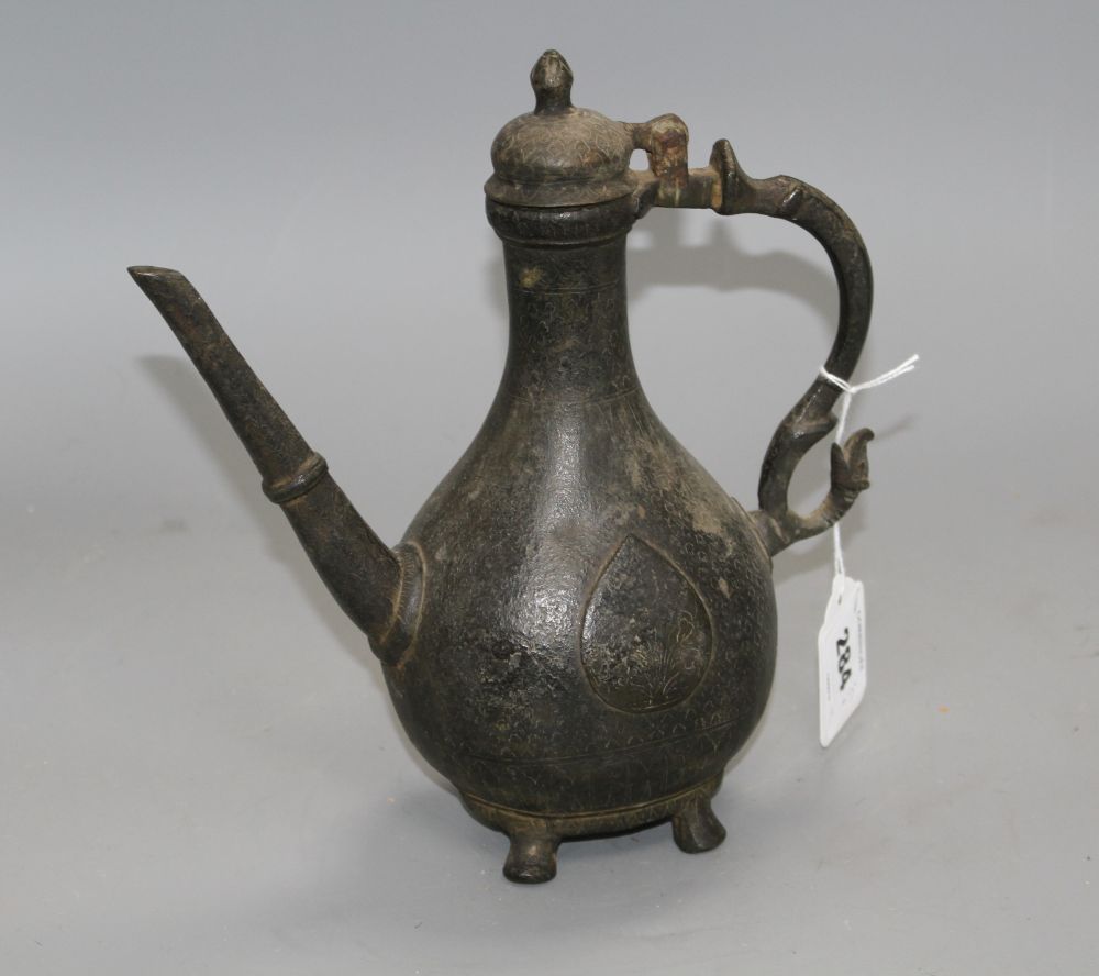 Two late 18th century Mughal brass ewers, H.11in. and 9.75in.